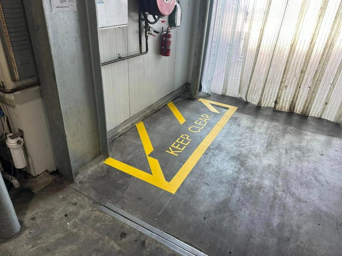 There Is a Yellow Line on The Floor that Says — Top End Line Markers Pty Ltd in Jabiru, NT