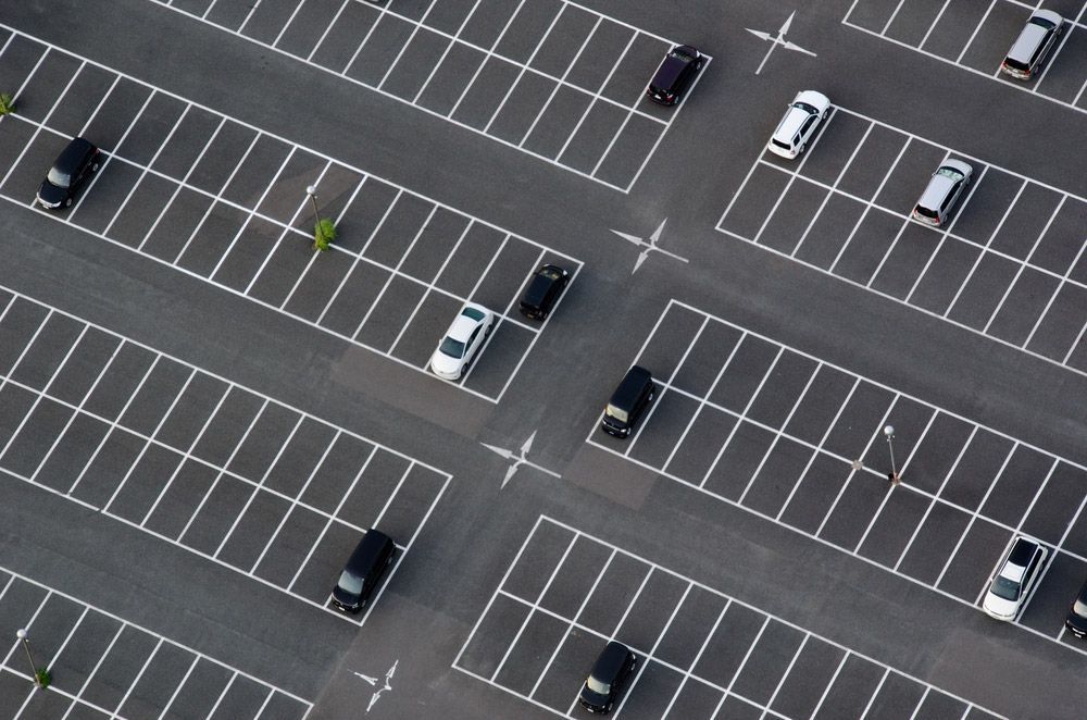 An Aerial View of A Parking Lot with Cars Parked in Rows — Top End Line Markers Pty Ltd in Jabiru, NT