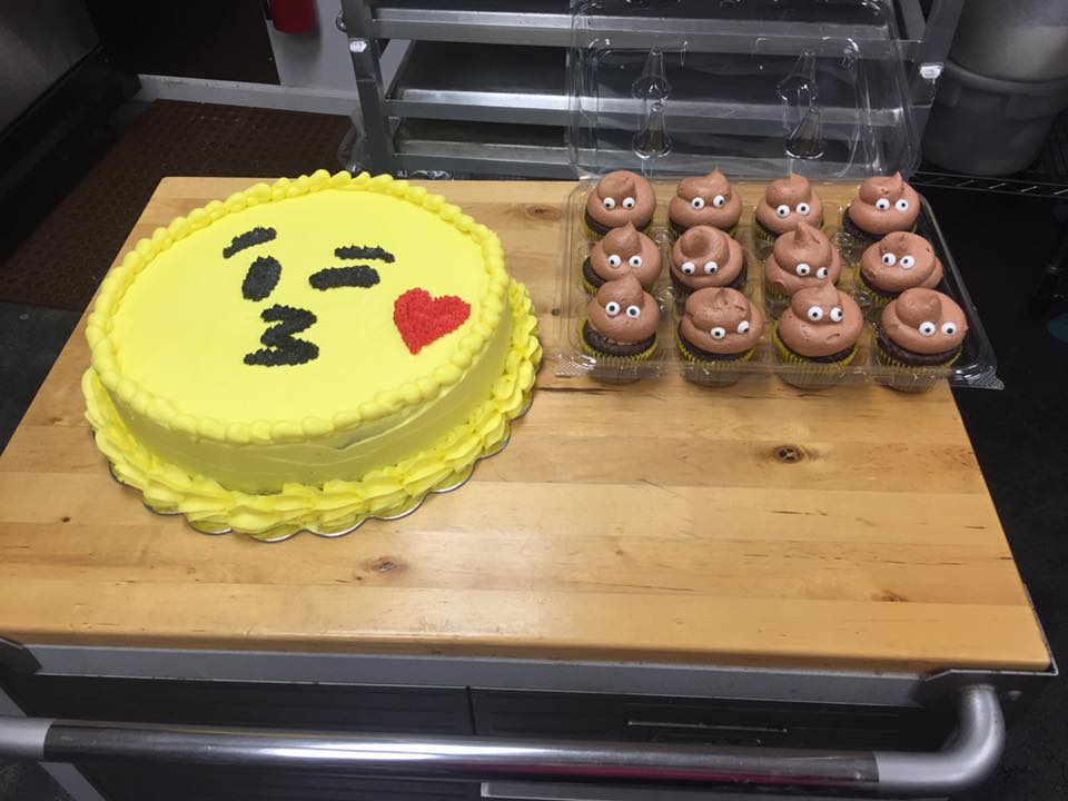 A yellow cake with a smiley face on it