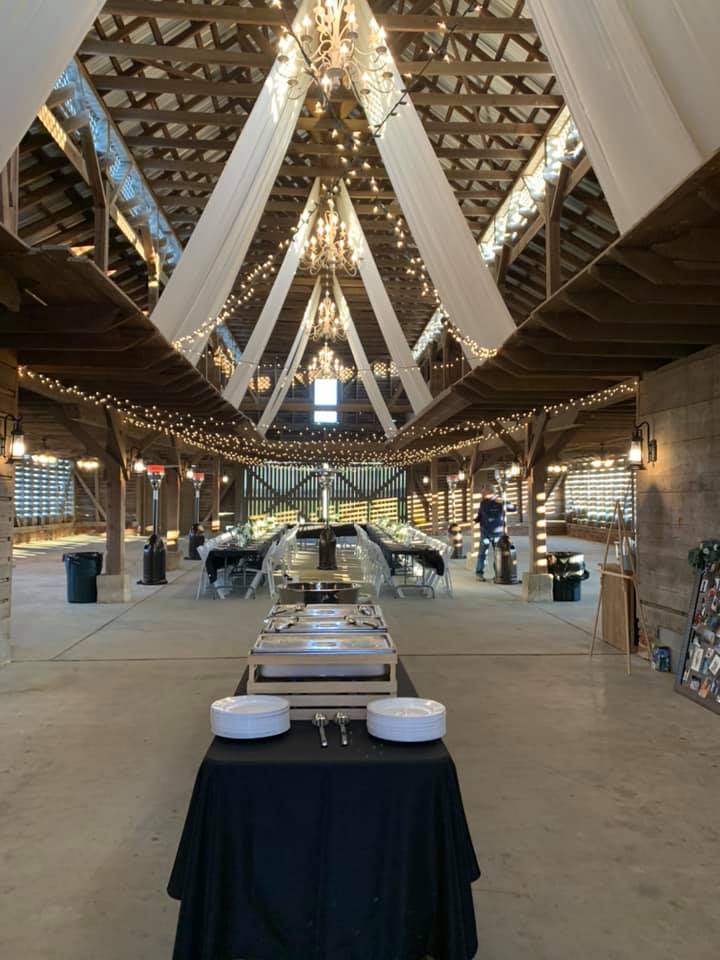 There is a buffet table in the middle of the room.