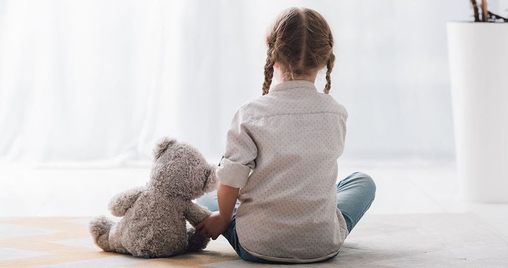 Child with a teddy bear