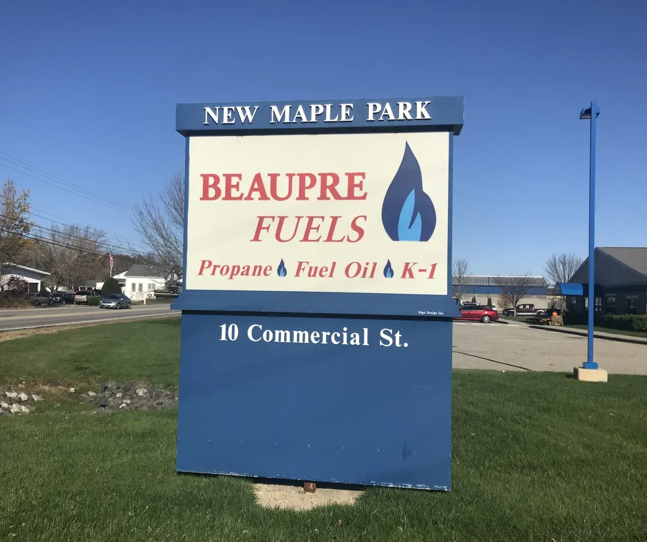A blue and white sign for beaupre fuels