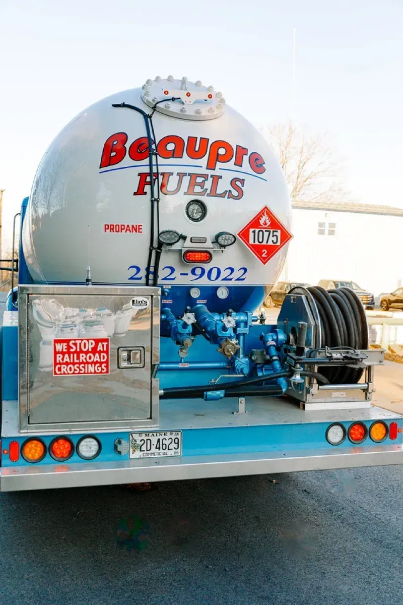 A beaupre fuels truck is parked on the side of the road