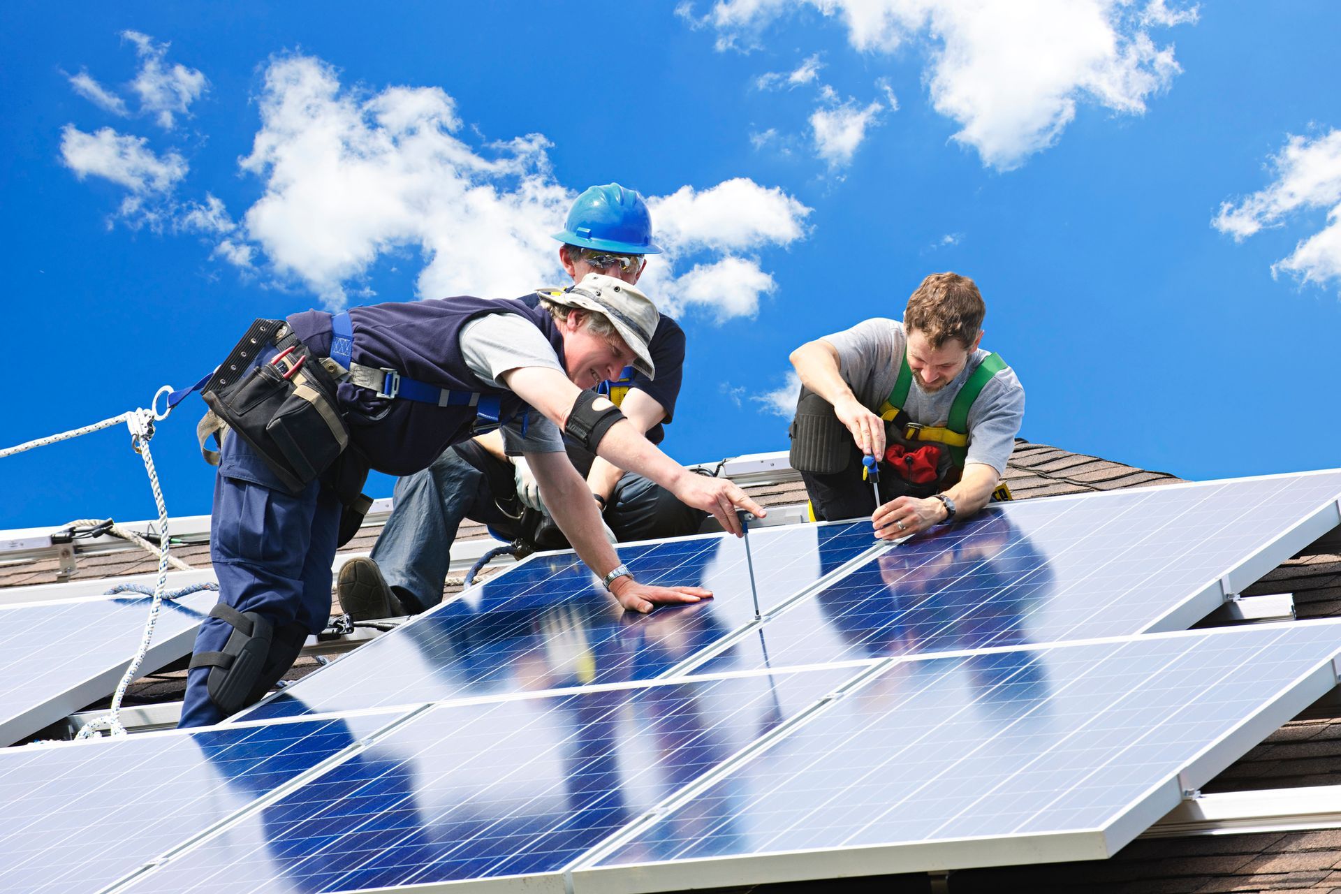 Workers Installing Solar Panels on Roof — Mildura, Vic — CFB Group