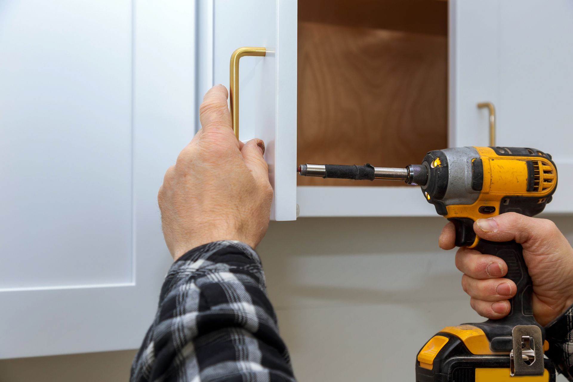 Installing Cabinet Handle — Mildura, Vic — CFB Group