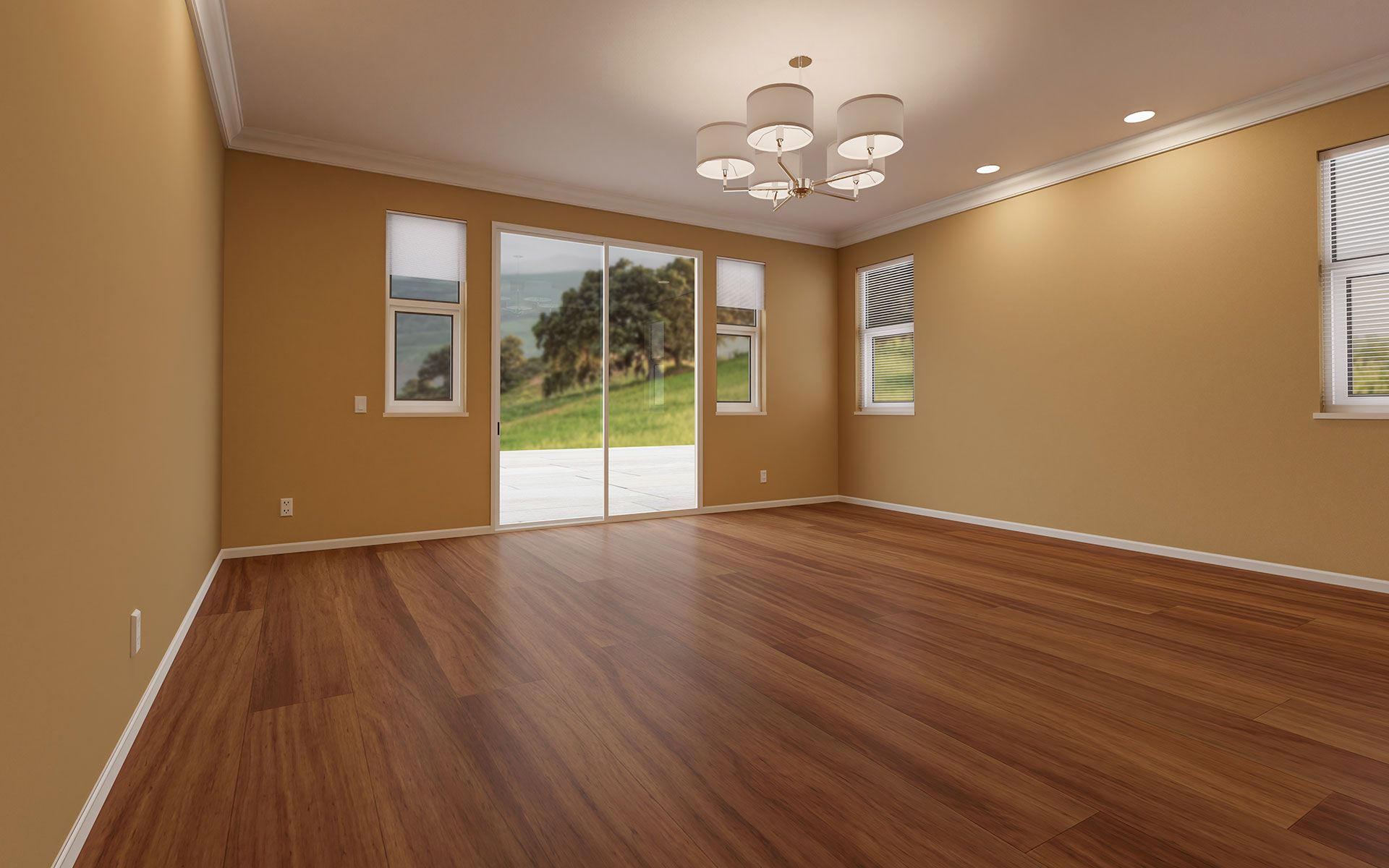 An empty living room with hardwood floors and sliding glass doors.