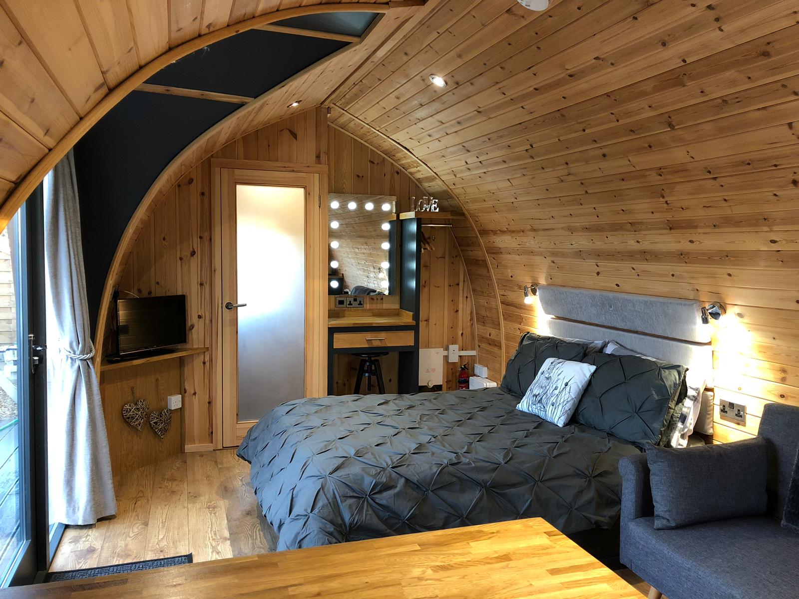 There is a large bed in the middle of the room.