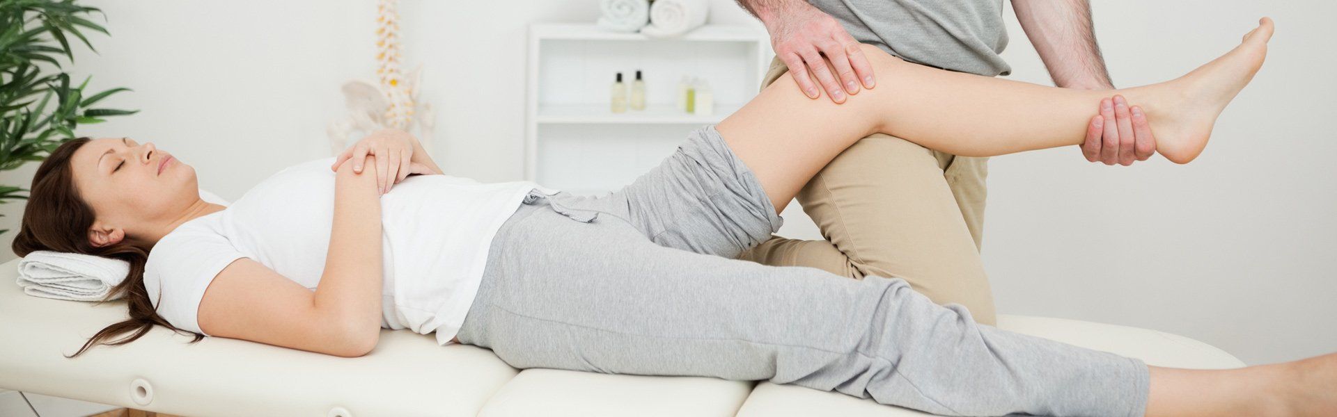 macquarie osteopaths peaceful brunette woman lying on a medical table