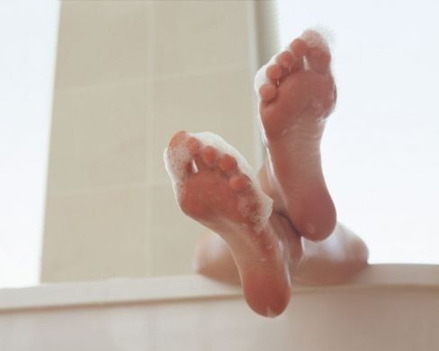 Soapy healthy feet after treatment at our Roma-based podiatry clinic