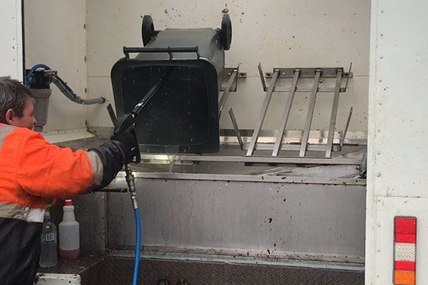 bin being cleaned