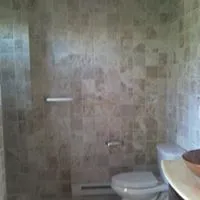 Clean and newly installed tiles on the bathroom walls — Stroudsburg, PA — Preferred Carpentry LLC
