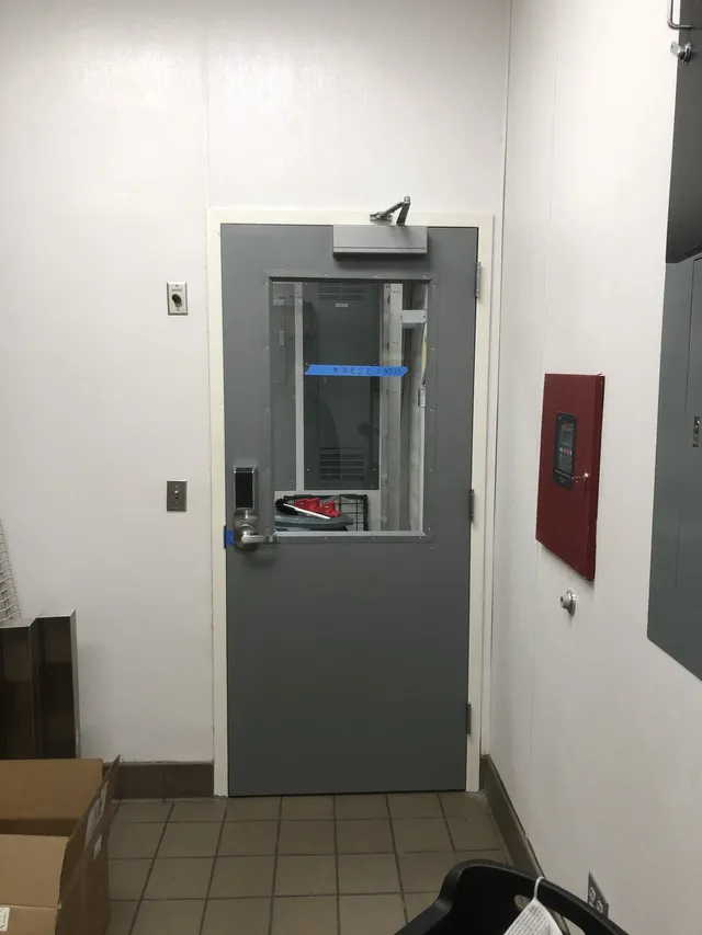 Gray colored fire exit door — Stroudsburg, PA — Preferred Carpentry LLC