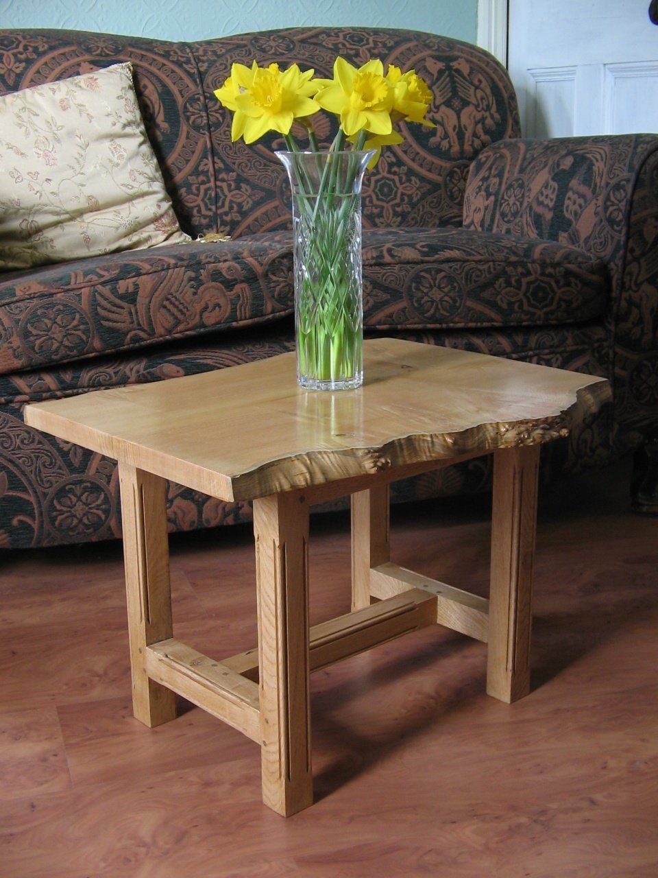 small side table in sweet chestnut polished in the timbers natural colour
