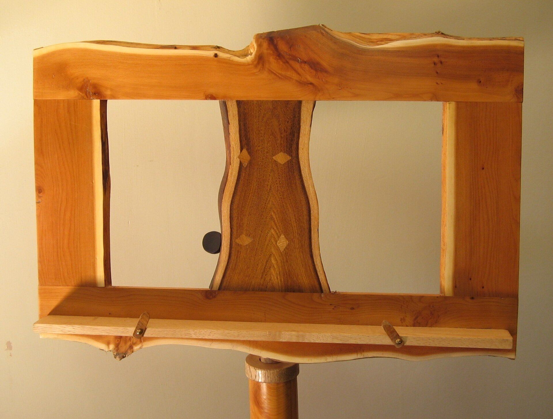 image of an adjustable music stand in english yew made by Patrick Turk the owner of Forest 2 Furniture using timber milled and dried by him