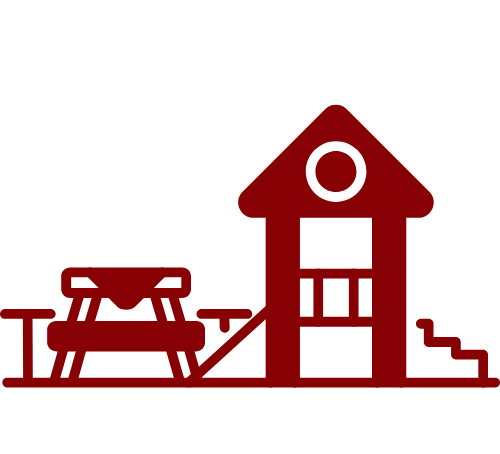 A red playground icon with a picnic table and stairs.