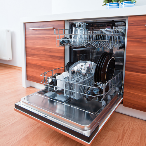 A dishwasher in a kitchen with the door open
