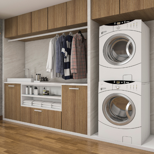 A laundry room with a washer and dryer stacked on top of each other.