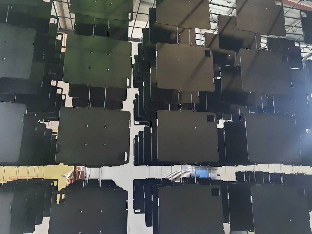 A Bunch Of Black Squares Hanging From The Ceiling — ADK Coatings In Gladstone, QLD