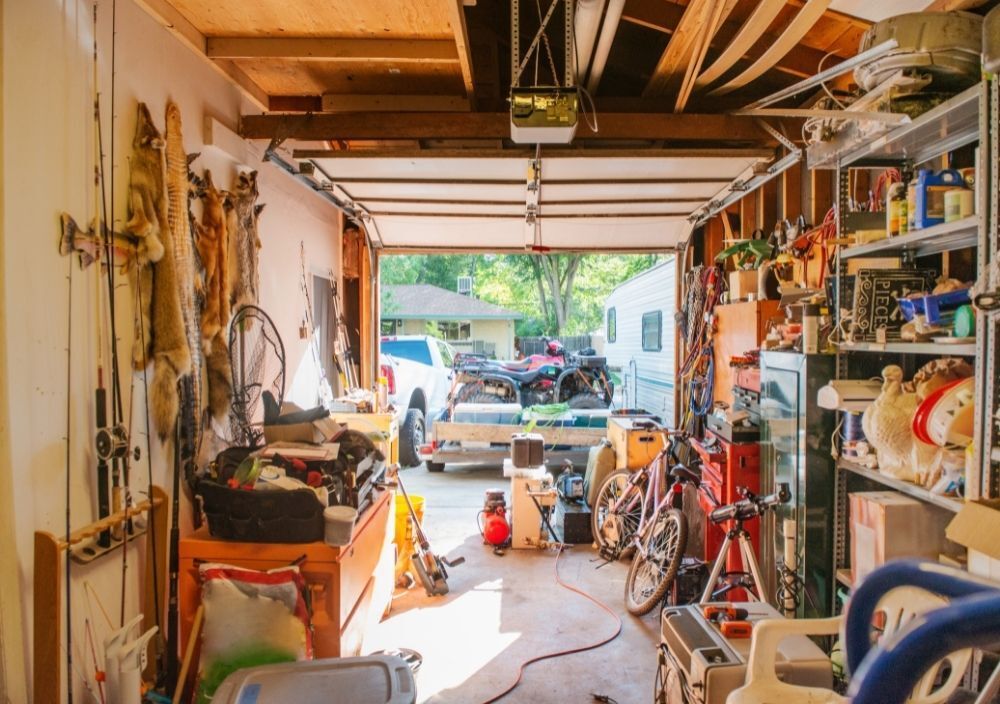 Cluttered garage ready to be cleared in Bridgend