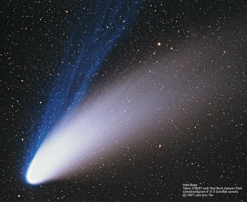 Zvaigžņu klāsteris caur Heila-Bopa komētas asti (A. Dimai, R.Volcan, D. Ghirardo)