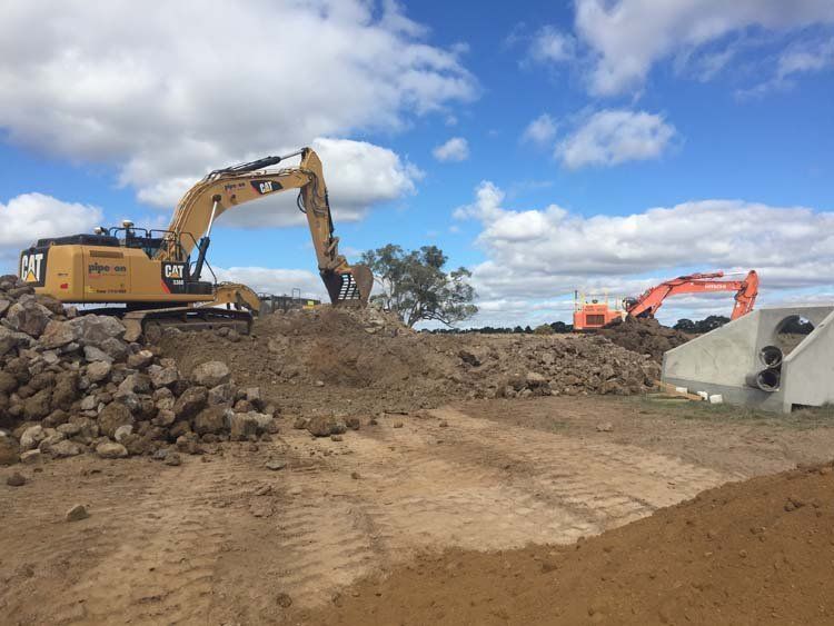 bulldozer moving dirt