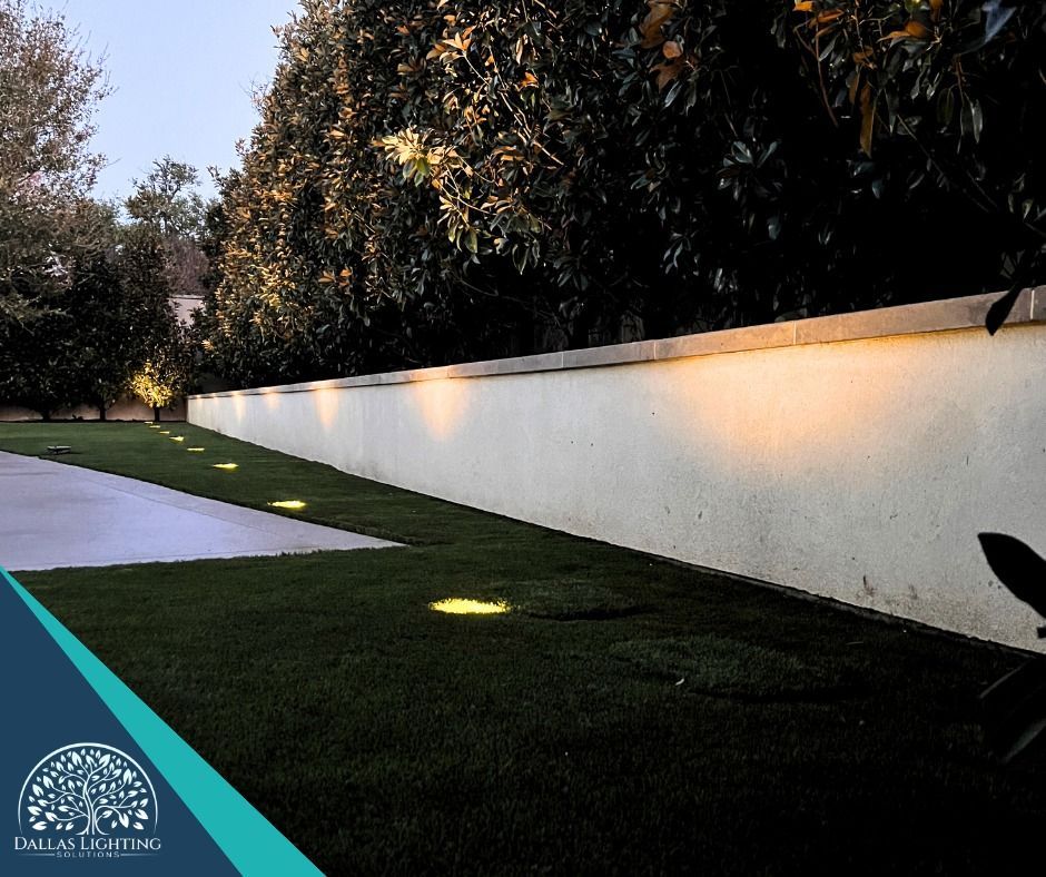 A white wall with a lot of lights on it