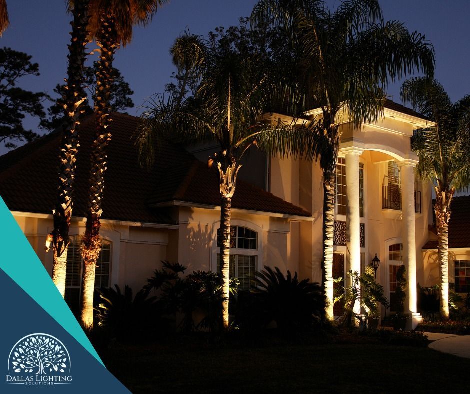 A large house with palm trees in front of it