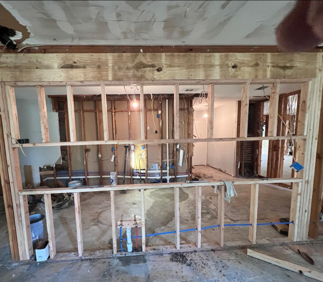 A room that is being remodeled with wooden frames.