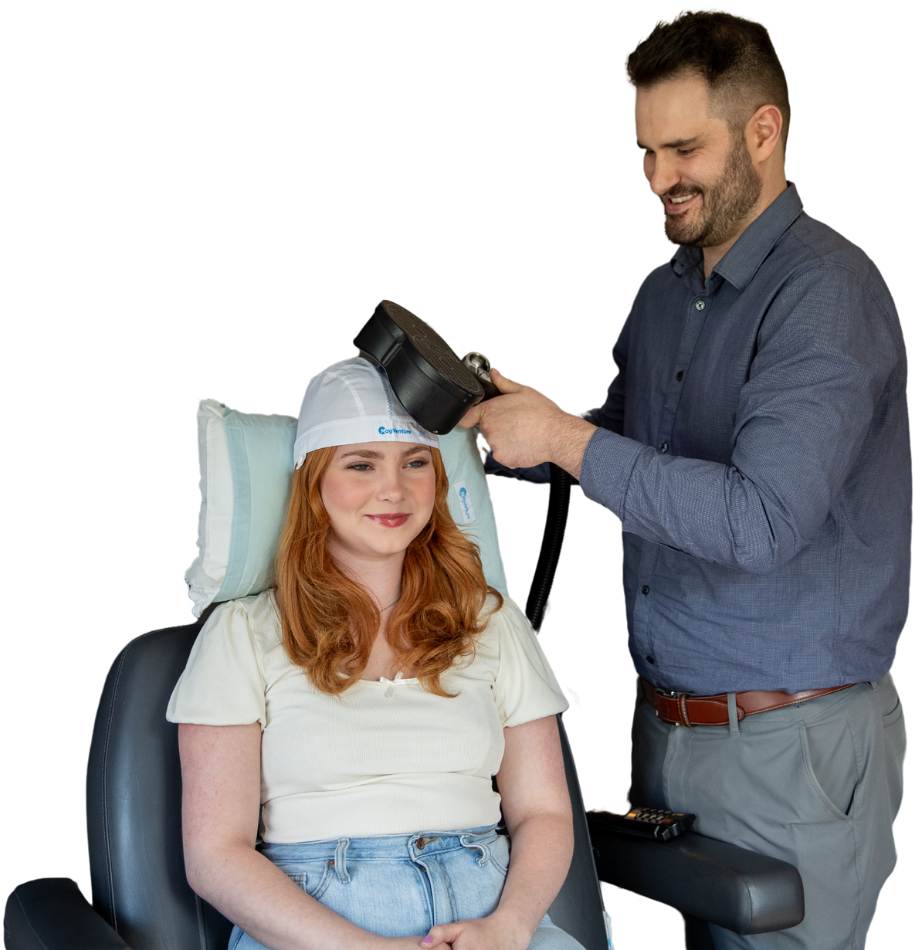 A man is putting a hat on a woman 's head