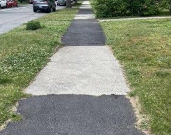 historic district sidewalk asphalt patching not  aesthetically pleasing