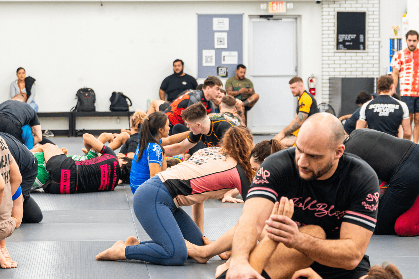 Students practice beginner striking drills at Simple Man Martial Arts in Austin, TX.
