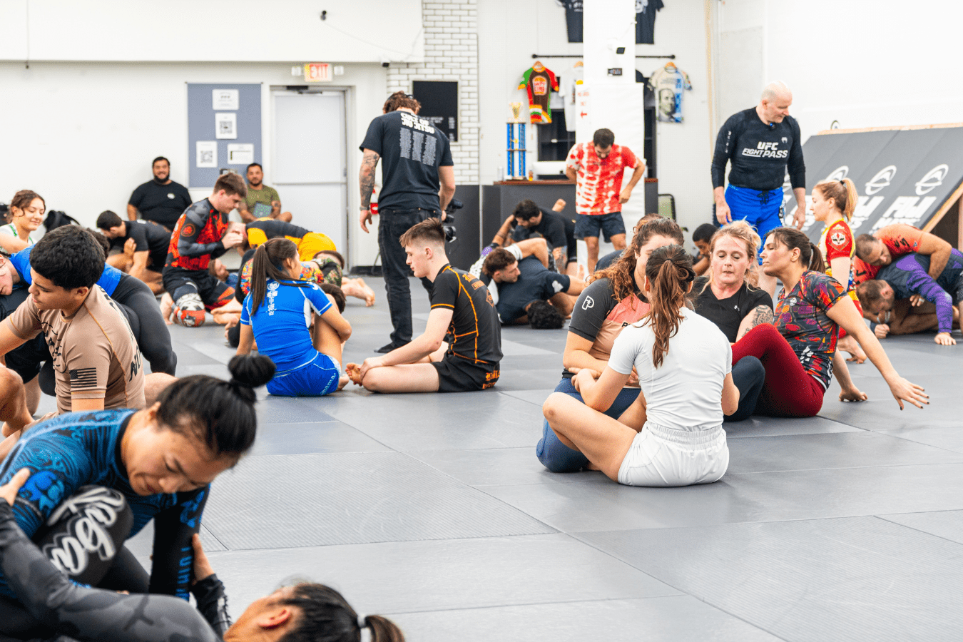Adults practicing no-gi grappling at Simple Man Martial Arts in Austin, TX, building fitness and confidence.