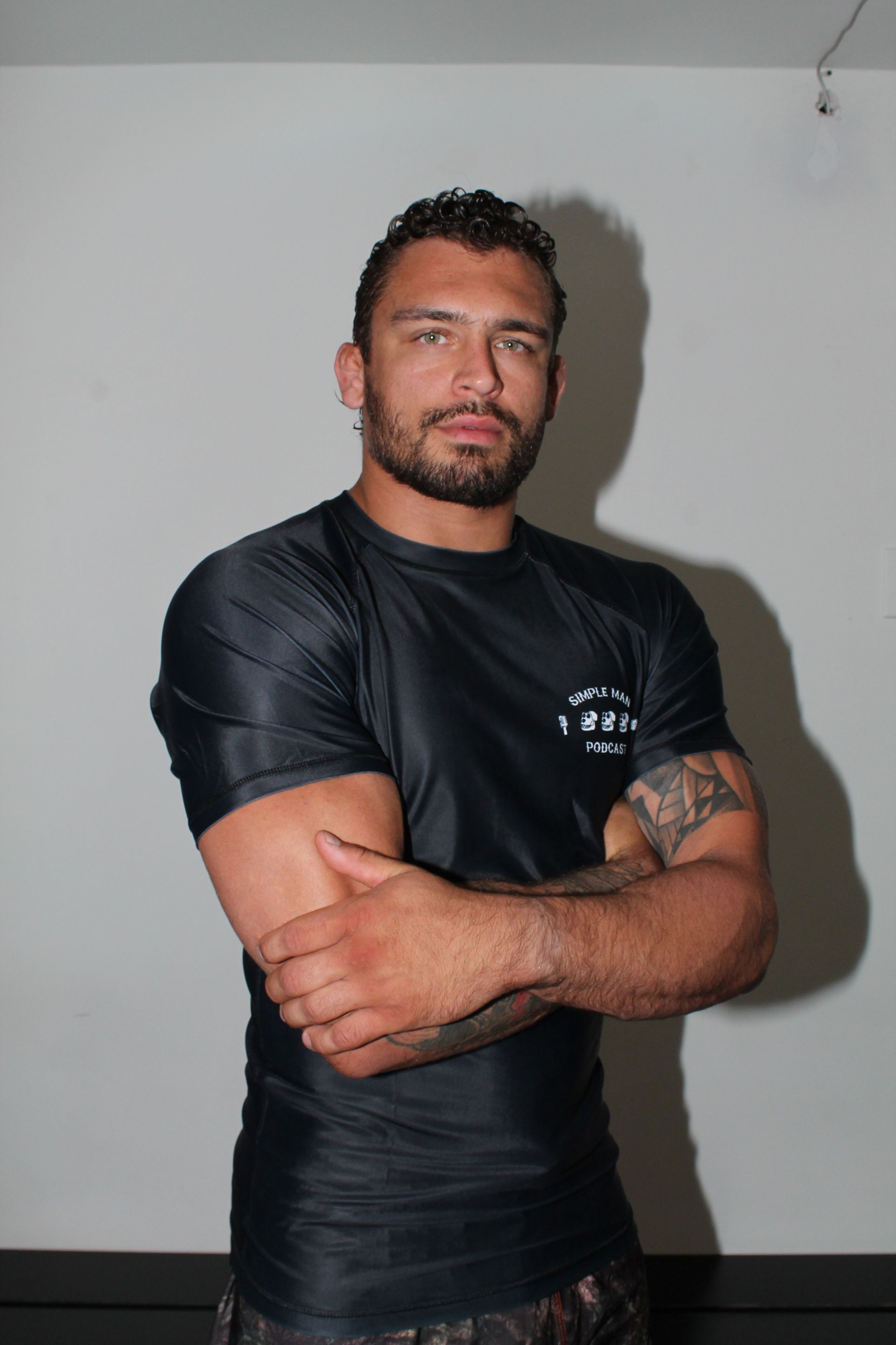 Students practicing pad drills at Simple Man Martial Arts in Austin, TX to build energy and sharper.