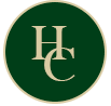 Green circular logo with gold border and interlocking gold letters “H” and “C”
