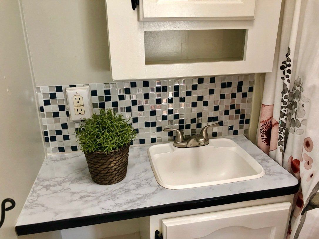 Sink And Plants — Sterling, CO — Town Square Realty