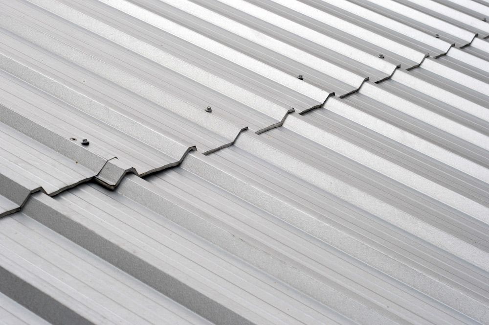 A Close Up View Of A Metal Roof — Topflite Roofing In Wollongong, NSW