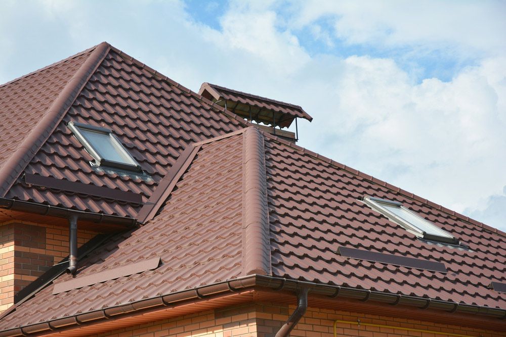 A House With A Brown Roof — Topflite Roofing In Nowra, NSW