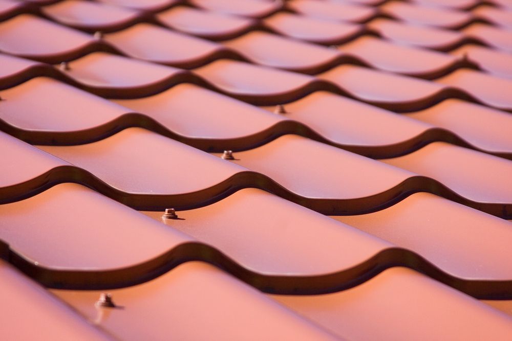A Close Up Of A Tiled Roof — Topflite Roofing In Shellharbour, NSW