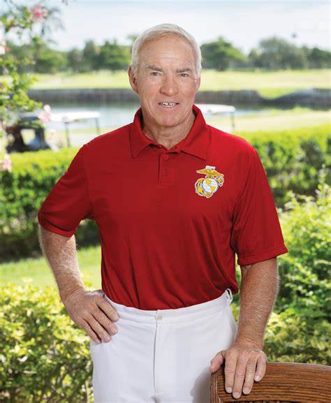 A man standing in a red casual outfit