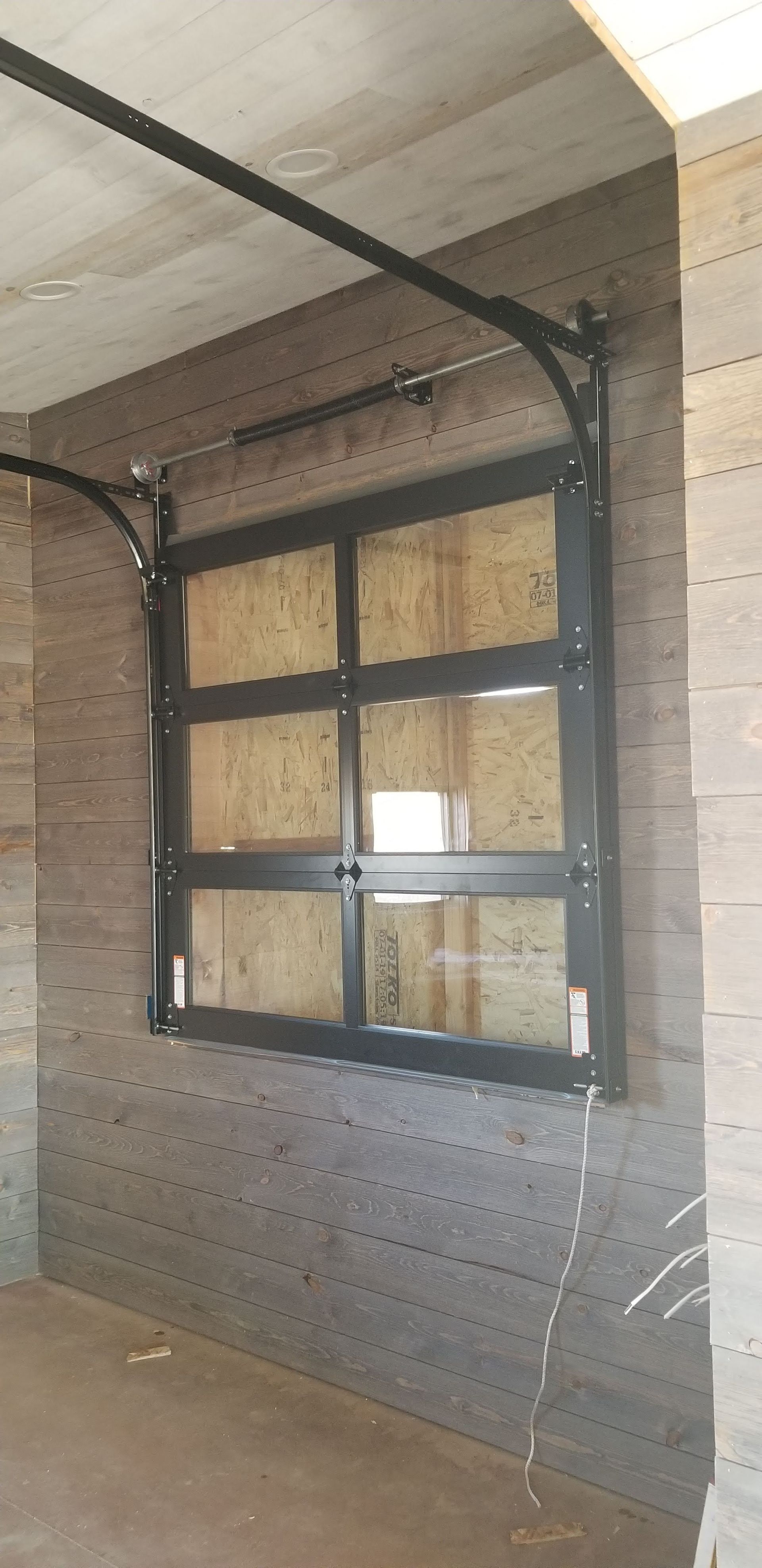 Garage Door with Black Frame — Laramie, WY — Southeastern Wyoming Garage Doors