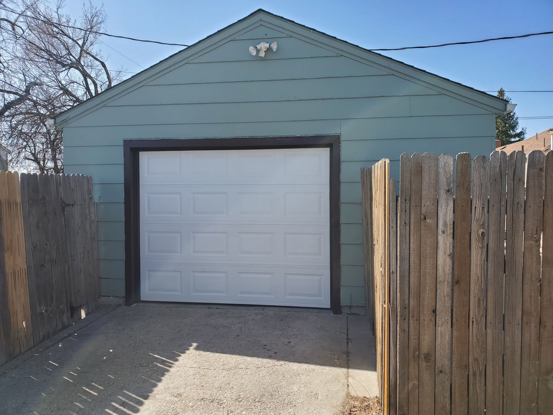 Garage with White Garage Door — Laramie, WY — Southeastern Wyoming Garage Doors