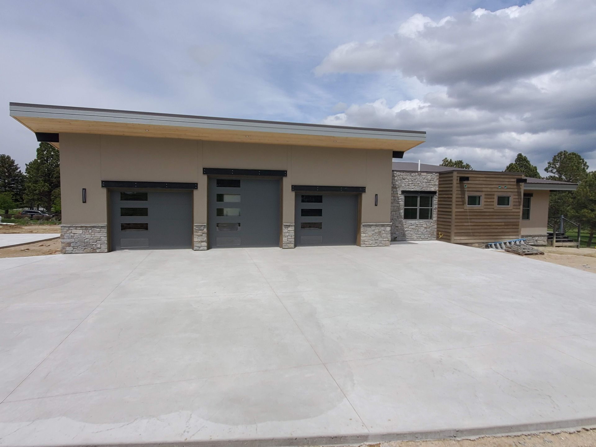 House with Three Garage Doors — Laramie, WY — Southeastern Wyoming Garage Doors