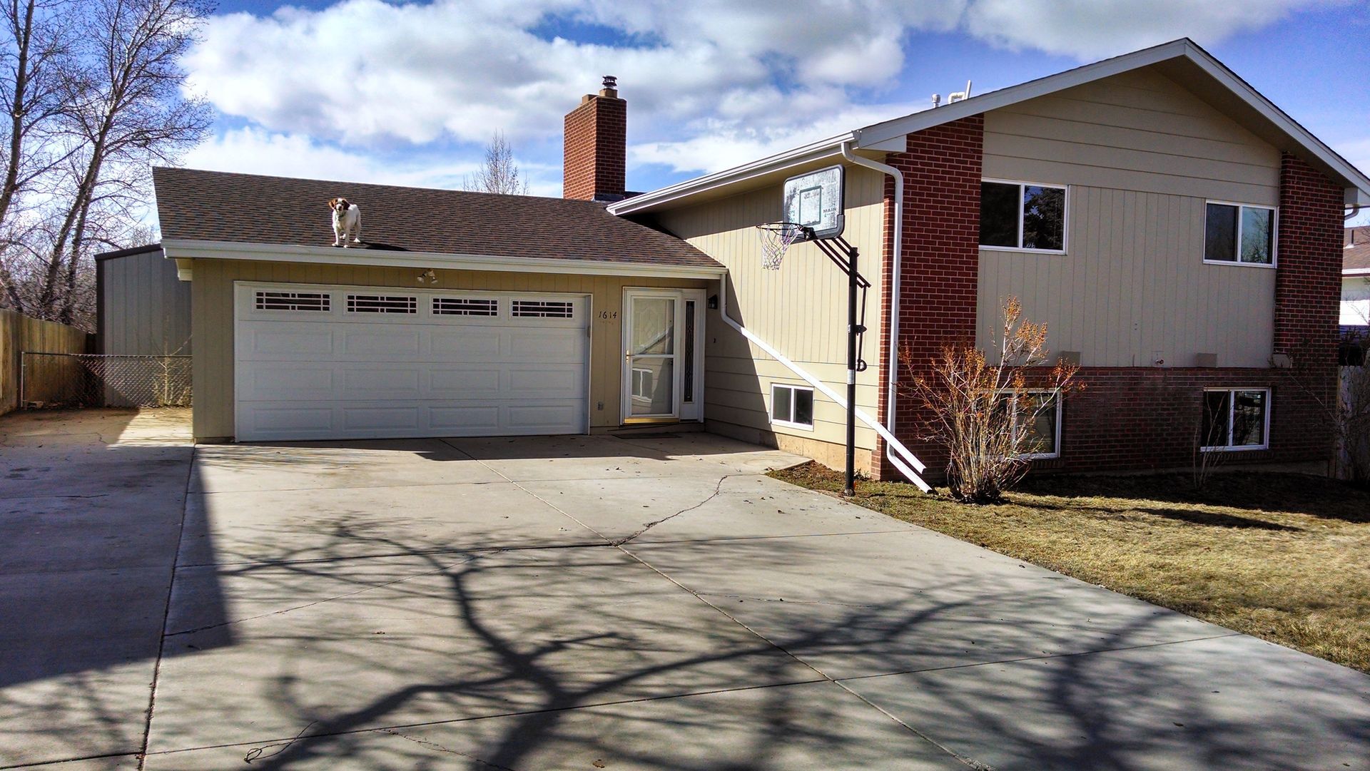 House with Big Garage — Laramie, WY — Southeastern Wyoming Garage Doors