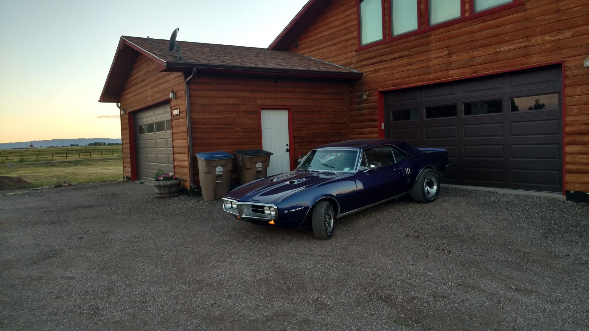 Car in Front of a House — Laramie, WY — Southeastern Wyoming Garage Doors
