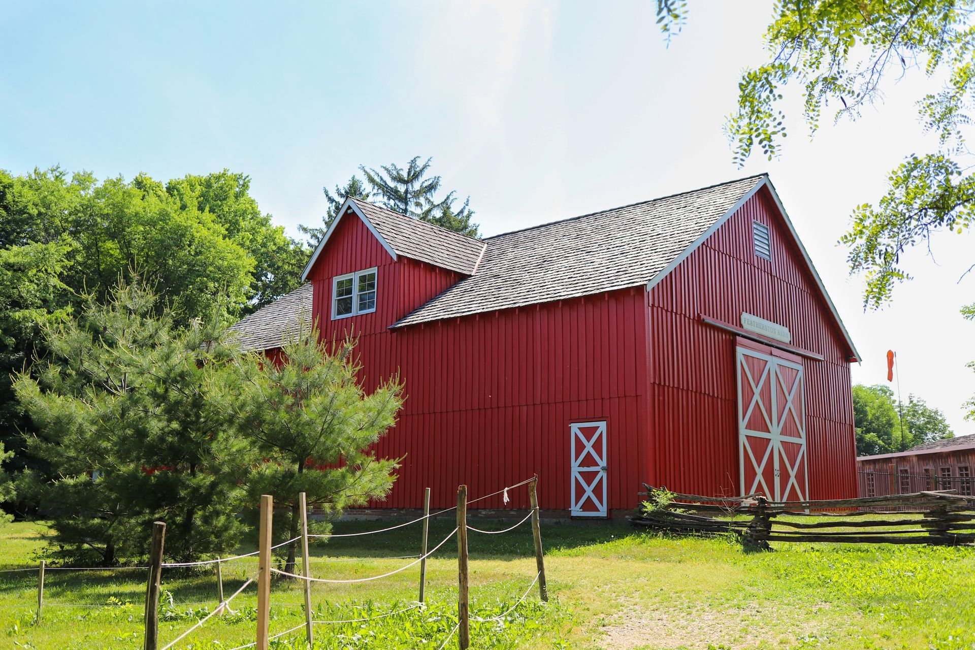a red barn that pops out after being painted