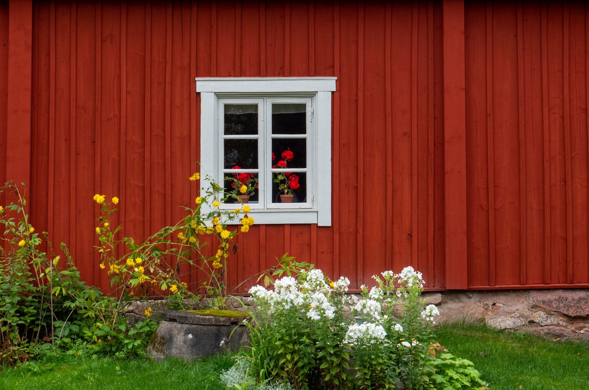 Barn trim painting in Northern CT, sealing edges and adding clean definition to freshly painted exterior siding.