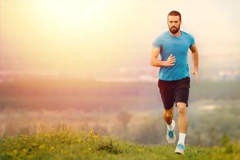 A Man Jogiging on a Field — Orlando, FL — Elysium Medical Group
