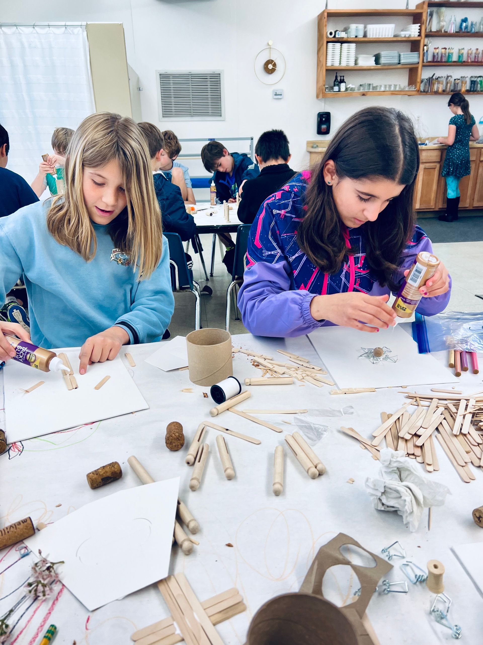 Montessori children working on an art project.
