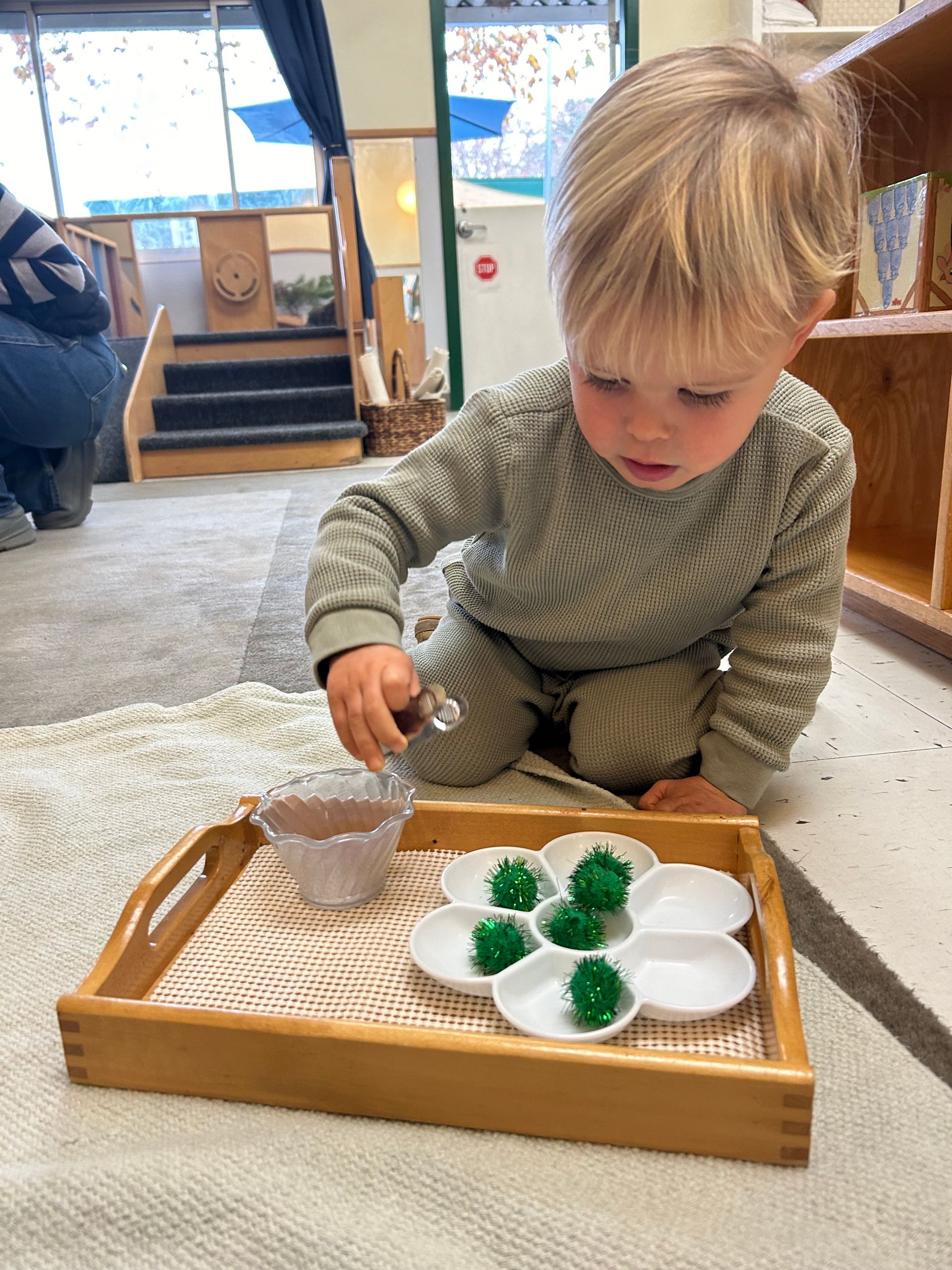 Montessori child working in the classroom.