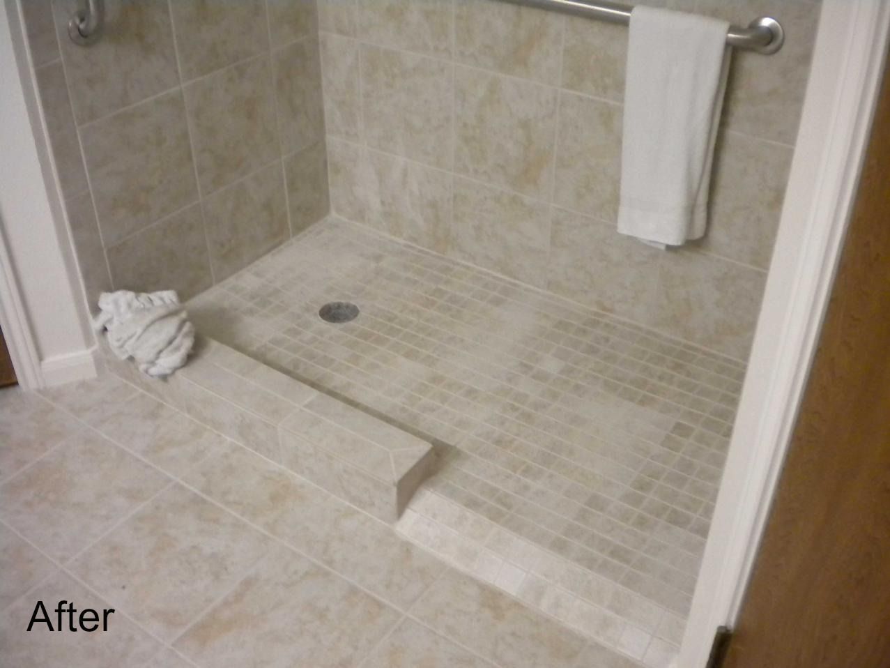 A bathroom with a walk in shower and the words after on the bottom